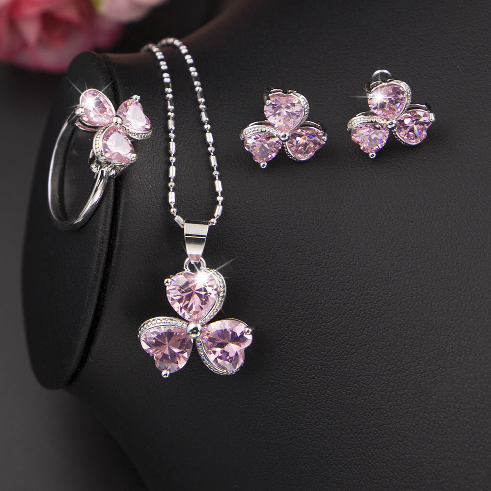 Conjunto de joyas de circón y trébol Zenitha: un toque de fortuna y elegancia