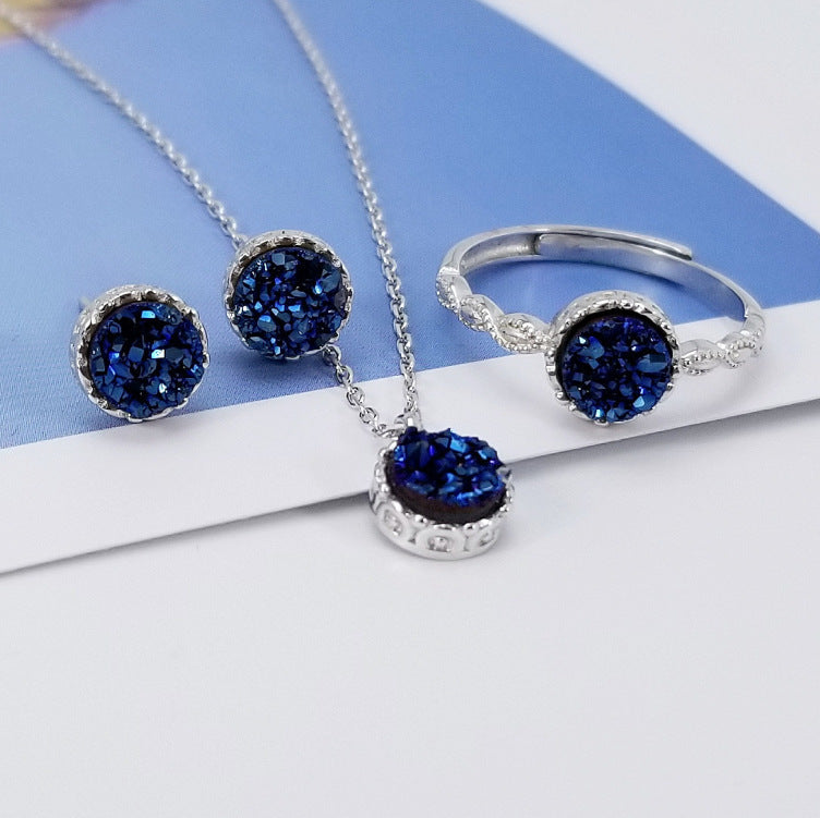 Conjunto de joyas Zenitha Midnight Bloom: Elegancia pura en azul intenso