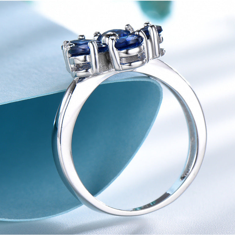 Zenitha Sapphire Bloom Ring – Where Petals Meet Poise