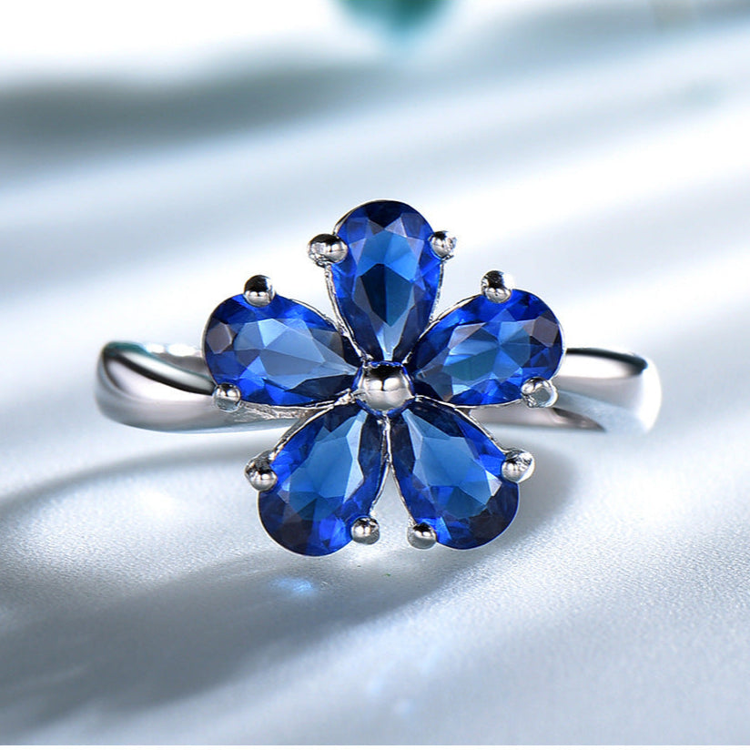 Zenitha Sapphire Bloom Ring – Where Petals Meet Poise