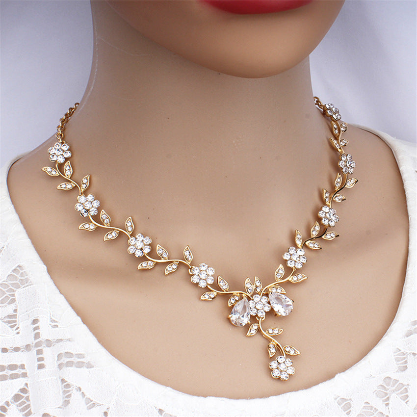 Conjunto de joyas Zenitha Plum Blossom: florece con gracia y luz