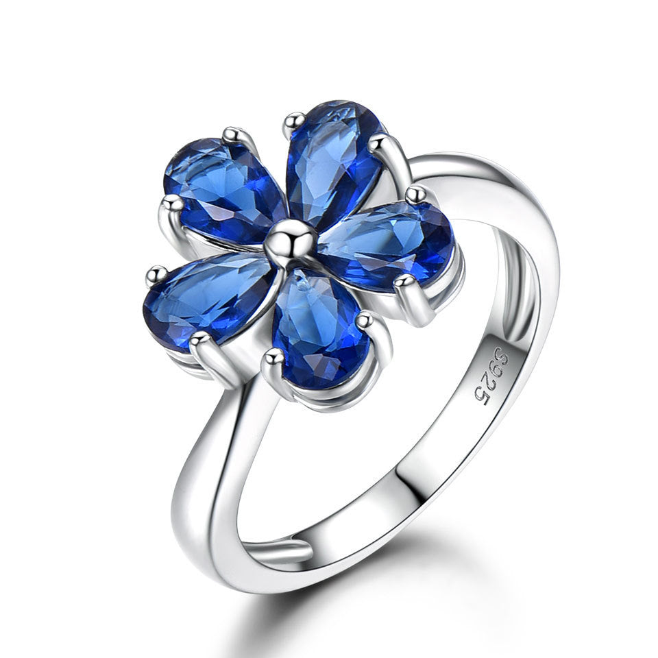 Zenitha Sapphire Bloom Ring – Where Petals Meet Poise