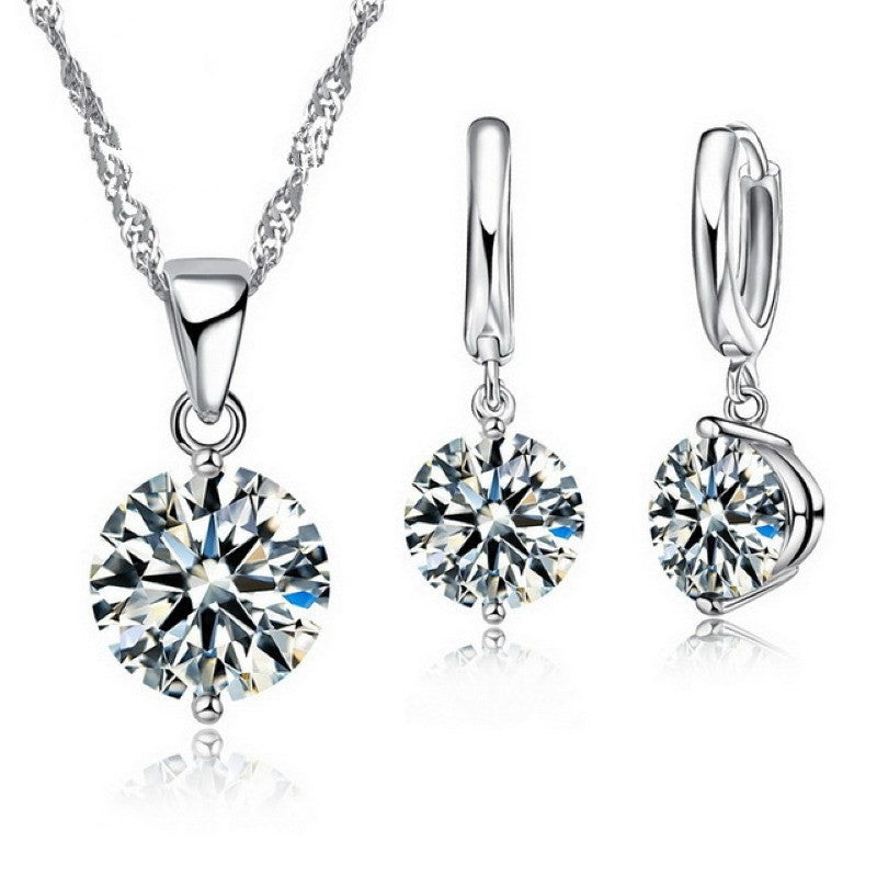 Conjunto de joyas Zenitha Crystal Radiance: pura elegancia en plata y luz