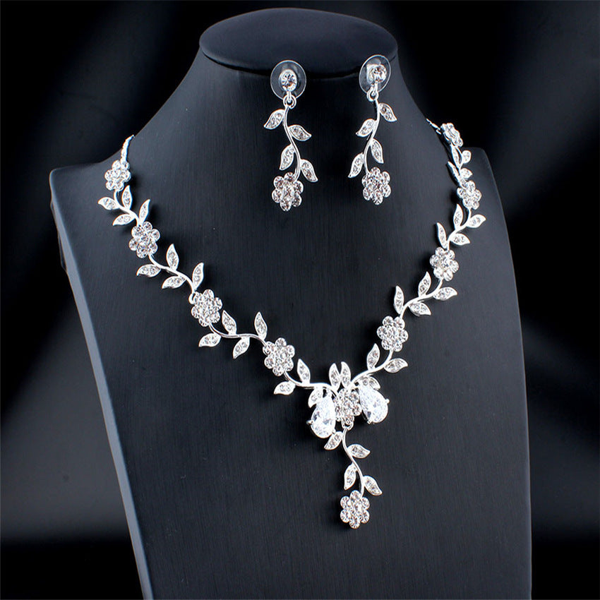 Conjunto de joyas Zenitha Plum Blossom: florece con gracia y luz