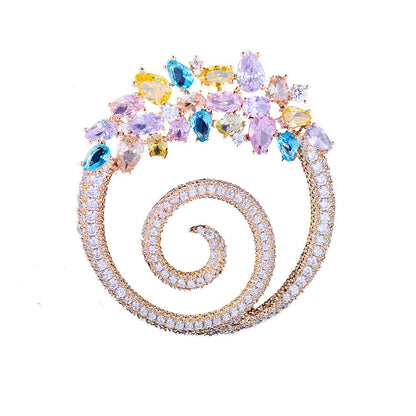 Zenitha Crystal Elegance Spiral Broche – Laat je energie bloeien in elke kleur
