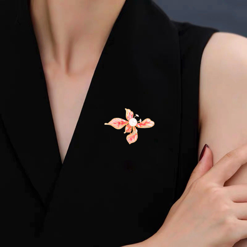 Broche Zenitha Bloomfire: Elegancia en cada pétalo