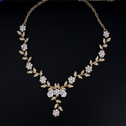 Conjunto de joyas Zenitha Plum Blossom: florece con gracia y luz