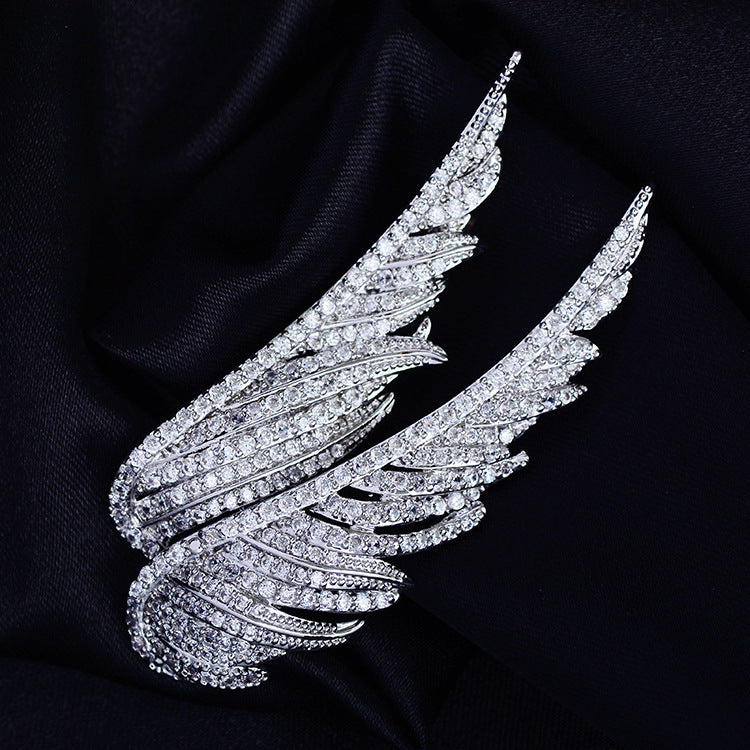Zenitha Guardian Wings Brooch – Where Strength Meets Stillness
