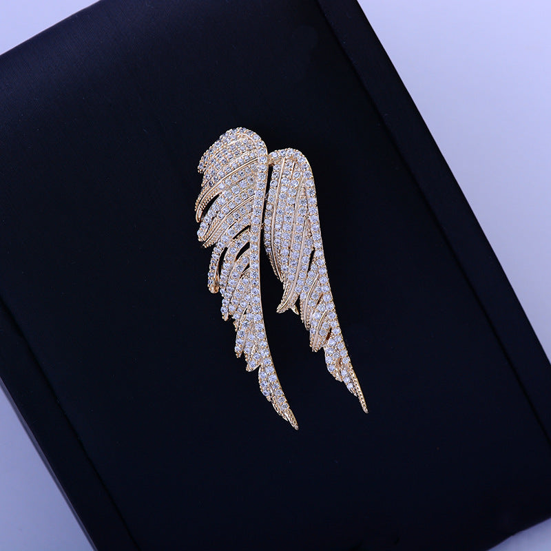 Zenitha Guardian Wings Brooch – Where Strength Meets Stillness