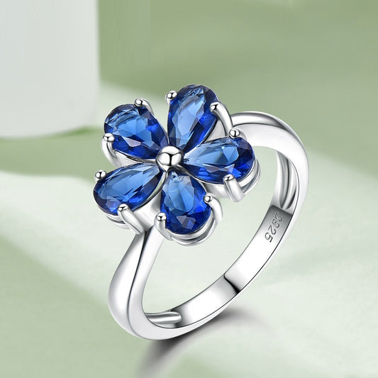 Zenitha Sapphire Bloom Ring – Where Petals Meet Poise