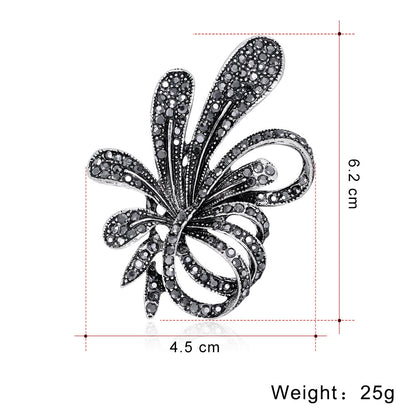 Zenitha Noir Ribbon Brooch – The Grace of Vintage Elegance