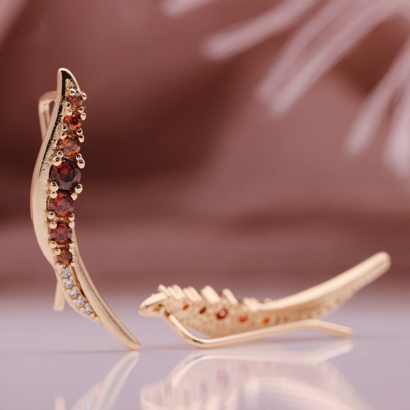 Zenitha Ember Arc Ohrringe – Wo Eleganz mit Feuer harmoniert